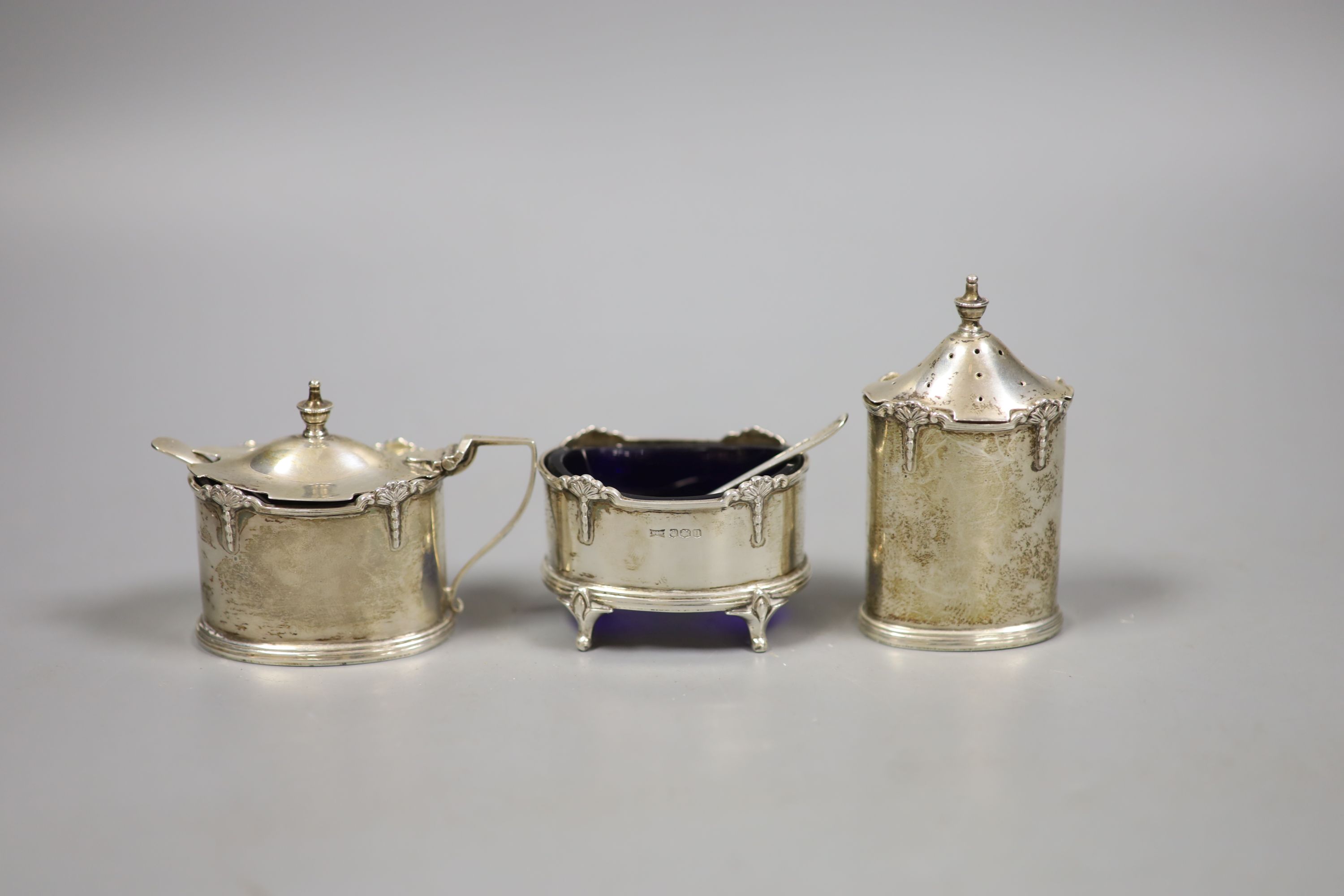 A George V silver three piece condiment set, by Mappin and Webb